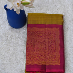 Saraswathi – Olive Green & Magenta Kanjivaram Silk Saree