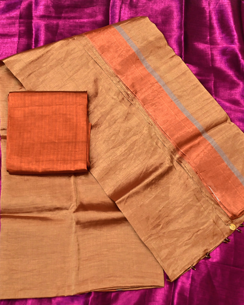 Suvarna – Pure Tissue Saree in Gold with Copper Border
