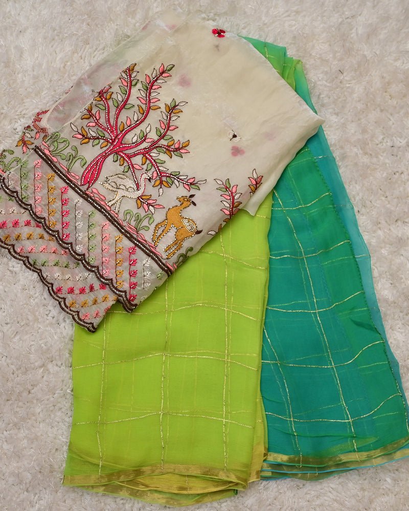 Suvi– Green Shaded Pure Chiffon Saree with Embroidered Tissue Blouse