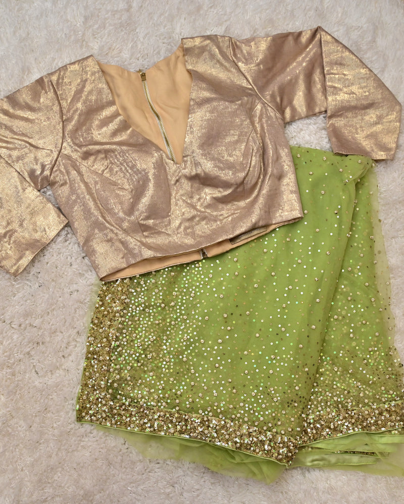 Prisha – Lime Green Net Saree with Gold Full-Sleeve Blouse