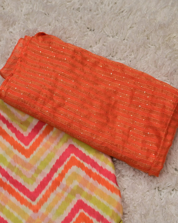 Tevini – Vibrant Crepe Saree with Orange Striped Blouse