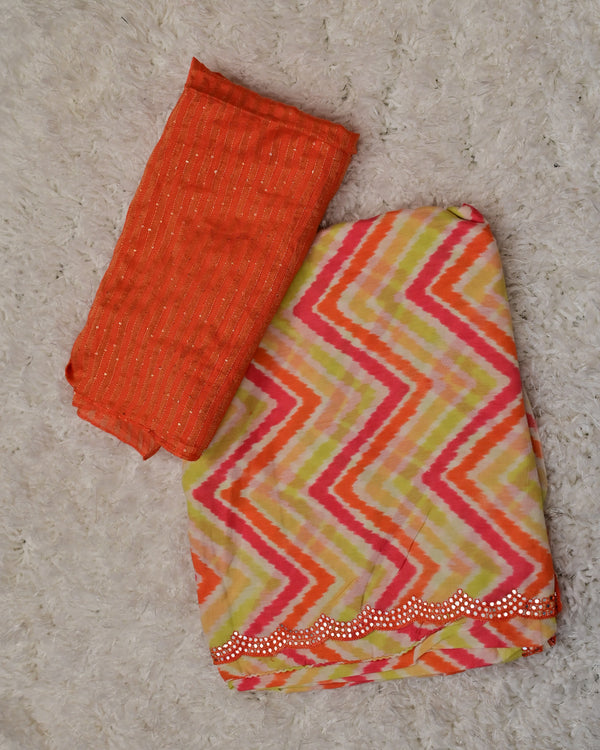 Tevini – Vibrant Crepe Saree with Orange Striped Blouse