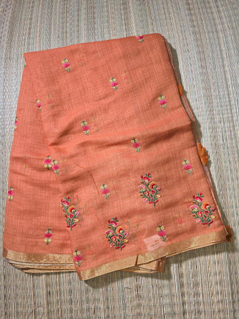 Linen Sari with Embroidered Motifs and Contrast Blouse